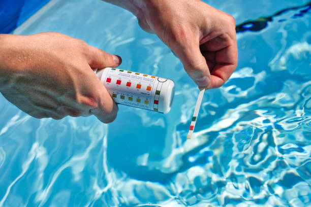 swimming pool test water on ph and chemical balance. high quality photo